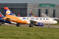 EI-EWF @ EIDW - Parked in the line of aircraft being stored - by Robert Kearney