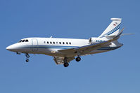 N448AS @ LAX - 2011 Dassault Falcon 2000EX N448AS with winglets on short final to RWY 25L. - by Dean Heald