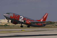 G-CELI @ LMML - B737 G-CELI of Jet2.com departing RW31 in Malta International Airport. - by raymond