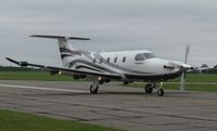 N32NG @ KAXN - Pilatus PC-12 landing after doing a demonstration flight for a video crew. - by Kreg Anderson