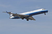 N732SK @ KORD - SkyWest Airlines/United Express Bombardier CL-600-2C10, SKW5339 arriving from Austin-Bergstrom Int'l /KAUS, RWY 14R approach at Chicago's O'hare-KORD. - by Mark Kalfas