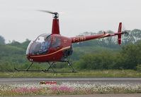 G-LINS @ EGFH - Resident R-22 Beta operated by Heli-air Wales. - by Roger Winser