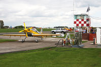 G-IIAI @ EGBR - Mudry CAP 232 at the pump, Breighton Airfield, April 2011. - by Malcolm Clarke