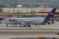 N689FE @ PHX - Taken at Phoenix Sky Harbor Airport, in March 2011 whilst on an Aeroprint Aviation tour - by Steve Staunton