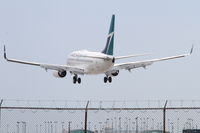 C-FWAQ @ KORD - Westjet Airlines Boeing 737-7CT, WJA1688 arriving from Vancouver International /CYVR, RWY 28 approach KORD. - by Mark Kalfas