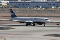 N673AW @ PHX - Taken at Phoenix Sky Harbor Airport, in March 2011 whilst on an Aeroprint Aviation tour - by Steve Staunton