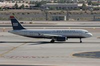 N673AW @ PHX - Taken at Phoenix Sky Harbor Airport, in March 2011 whilst on an Aeroprint Aviation tour - by Steve Staunton