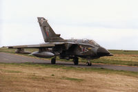 ZA410 @ EGQS - Tornado GR.1, callsign Jackal 1, of 12 Squadron taxying to the active runway at RAF Lossiemouth in April 1996. - by Peter Nicholson