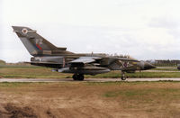ZA410 @ EGQS - Tornado GR.1, callsign Jackal 1, of 12 Squadron joining Runway 05 at RAF Lossiemouth in April 1996. - by Peter Nicholson