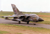ZA473 @ EGQS - Tornado GR.1B, callsign Jackal 2, of 12 Squadron taxying to Runway 05 at RAF Lossiemouth in May 1996. - by Peter Nicholson