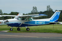 G-NWFC @ EGSX - recently repainted by Mick Allen of Turweston in Boeing Dreamliner colours - by Chris Hall