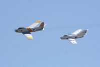 N186AM @ KCNO - F-86 being chased - by Nick Taylor