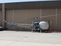 N54047 @ CNO - Covered and parked near hanger - by Helicopterfriend