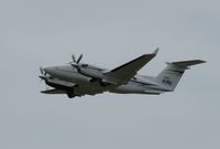 N1MU @ KAXN - Beech B200 Super King Air departing runway 13. - by Kreg Anderson