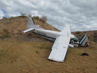 N275PM - Shortly afterwards, on golf course - by Ben Chesley, skydiver on load