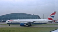 G-BNWA @ LHR - Taxiing at Heathrow - by Murat Tanyel