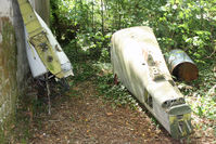F-GKEN @ LFRV - Wreckage stored beside a hangar. - by Howard J Curtis
