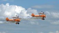 N5057V @ EGSU - 45. The Breitling Wingwalkers at another excellent Flying Legends Air Show (July 2012.) - by Eric.Fishwick