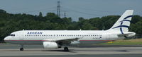 SX-DVT @ EDDL - Aegean Airlines, is lining up RWY 23L at Düsseldorf Int´l (EDDL) - by A. Gendorf