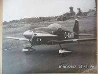 G-AWIR @ EGBG - the owner and builder Ken Sword taxying from the hangar at leicester where it was built and based .picture is of a B&W print i have at home  - by Ken Sword jnr