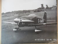 G-AWIR @ EGBG - the owner and builder Ken Sword taxying from the hangar at leicester where it was built and based .picture is of a B&W print i have at home 