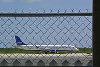 N236JB @ NAS - Photographed from behind bars at Nassau Intl - by Murat Tanyel