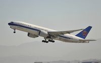 B-2080 @ KLAX - Departing LAX on 25R - by Todd Royer