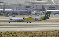 N407QX @ KLAX - Taxiing to gate after arriving at LAX on 25L