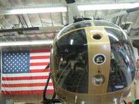 N108PP @ POC - Parked in her hanger by her flag - by Helicopterfriend