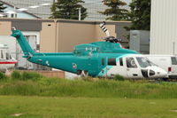 B-HJR @ CYYC - Ex Hong Kong Registered Sikorsky S-76C+, c/n: 760497 at Eagle Helicopters at Calgary - by Terry Fletcher