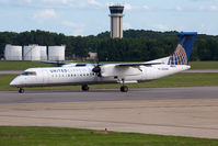 N196WQ @ ORF - United Express (Colgan Air) N196WQ (FLT CJC4920) taxiing to RWY 23 for departure to Newark Liberty Int'l (KEWR).