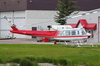 C-FALK @ CYYC - Bell 212, c/n: 30982 at Calgary - by Terry Fletcher