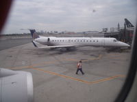 N11127 @ EWR - This ERJ-145  was taken from a Boeing 757-200 - by christian maurer