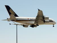 9V-SKC @ KLAX - Landing 24L - by Jonathan Ma