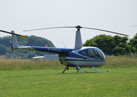 G-HVER @ EGTB - Robinson R44 Raven at Wycombe Air Park - by moxy