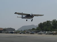 N5072K @ SZP - 1967 Helio H-295 SUPER COURIER STOL conversion to HT-295 tri-gear, Lycoming GO-480-G1D6 295 Hp, takeoff climb Rwy 22 - by Doug Robertson