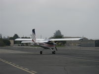 N5072K @ SZP - 1967 Helio H-295 SUPER COURIER STOL conversion to HT-295 tri-gear, Lycoming GO-480-G1D6 295 Hp geared engine, taxi to 22 for a series of takeoffs, a high-speed pass and landings with pax. - by Doug Robertson