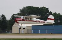 N76867 @ KOSH - Cessna 140 - by Mark Pasqualino