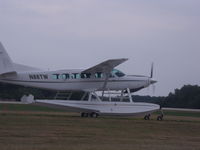 N88TW @ OSH - cessna 208 seaplane on the taxiway - by christian maurer