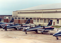MM54475 @ EGVA - MB-339B, callsign India 4477, number 3 of the Italian Air Force's Frecce Tricolori aerobatic team with others on the flight-line at the 1987 Intnl Air Tattoo at RAF Fairford. - by Peter Nicholson