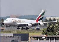 A6-EDU @ AMS - The first landing of the A380 of Emirates on Amsterdam Airport on runway C18 - by Willem Göebel