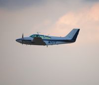 N717T @ KOSH - Departing EAA Airventure/Oshkosh on 24 July 2012. - by Glenn Beltz