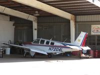 N7204L @ CCB - Parked in Foothill Aircraft Sales & Service work bay - by Helicopterfriend