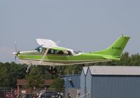 C-GUEK @ KOSH - Cessna P206D - by Mark Pasqualino