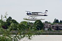 C-FCDQ @ YVR - Landing on the Fraser River - by metricbolt