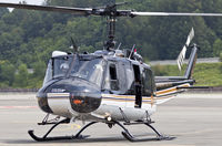 N815SC @ KBFI - The Sheriff is now in town! The big UH-1H making a great entrance in for the show - by Dan King