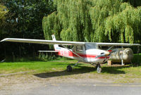 G-GLED @ EGTR - parked at the airfield entrance with a For Sale sign in the window - by Chris Hall