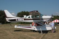 C-GNPN @ OSH - 1981 Cessna TU206G, c/n: U20606194 - by Timothy Aanerud
