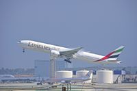 A6-ECO @ KLAX - Emirates departing Rwy 25R to Dubai - by speedbrds