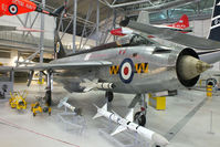 XM135 @ EGSU - In 74 'Tiger' squadron colours displayed inside the AirSpace hangar, Duxford - by Chris Hall